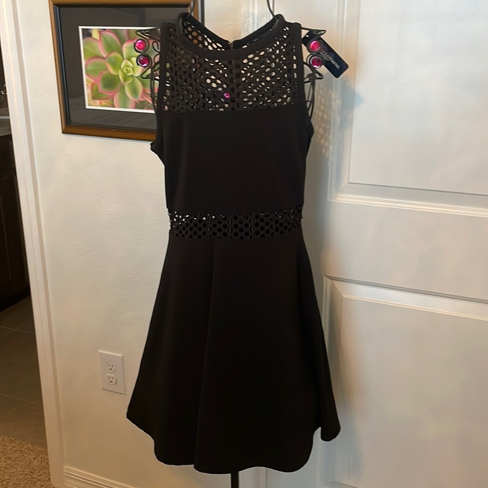 Black sleeveless fit and flare with cut outs